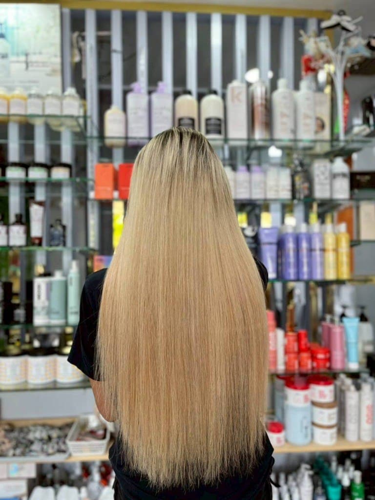 Long honey blonde hair colour at House of Beauty Phuket