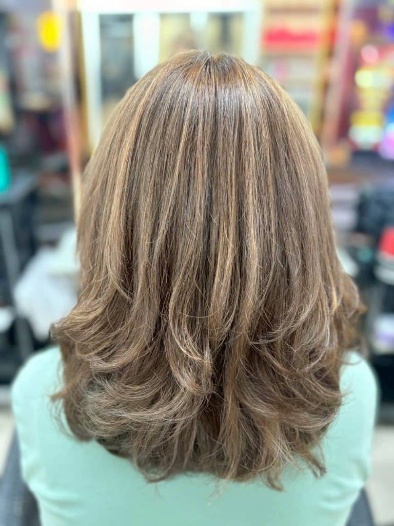 Layered hair colour with voluminous blowout at House of Beauty Phuket